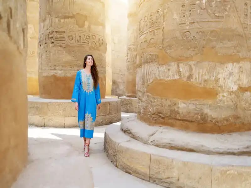 A tourist in Luxor Temple A tourist in Luxor Temple