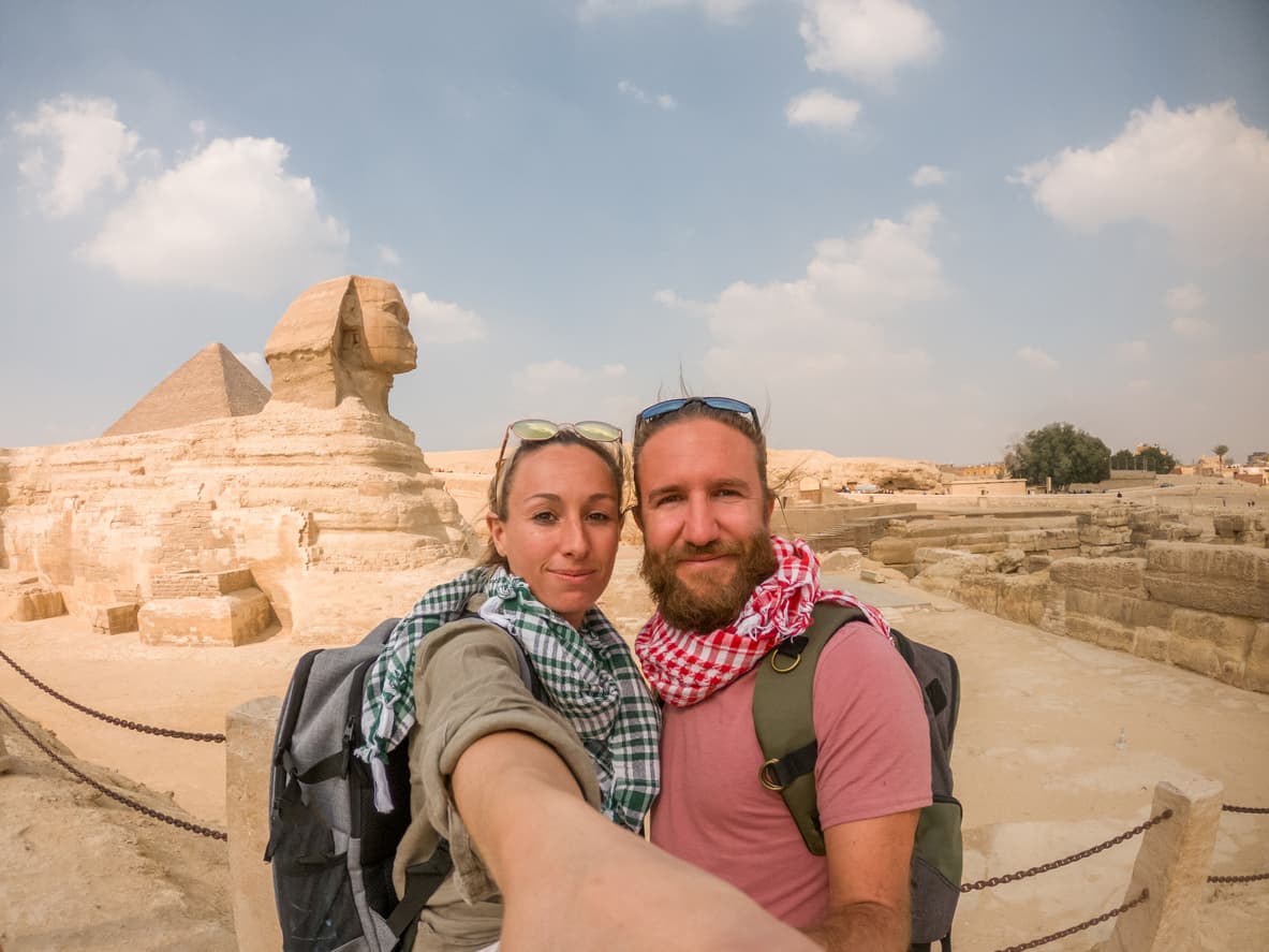 Giza Pyramids, Nile by Air Tour couple take selfie at the pyramids, Giza Pyramids, Nile by Air Tour
