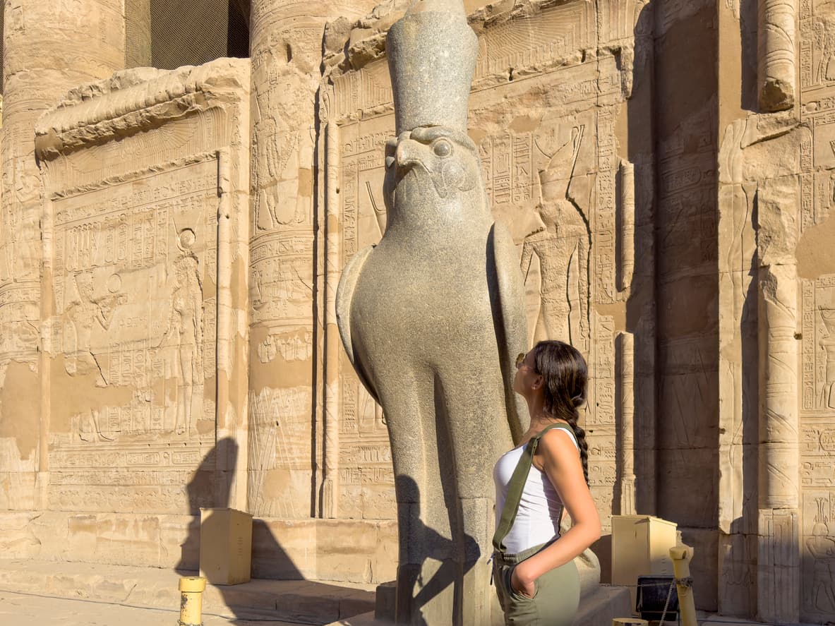 Trip to Egypt a woman in front of edfu temple, Trip to Egypt