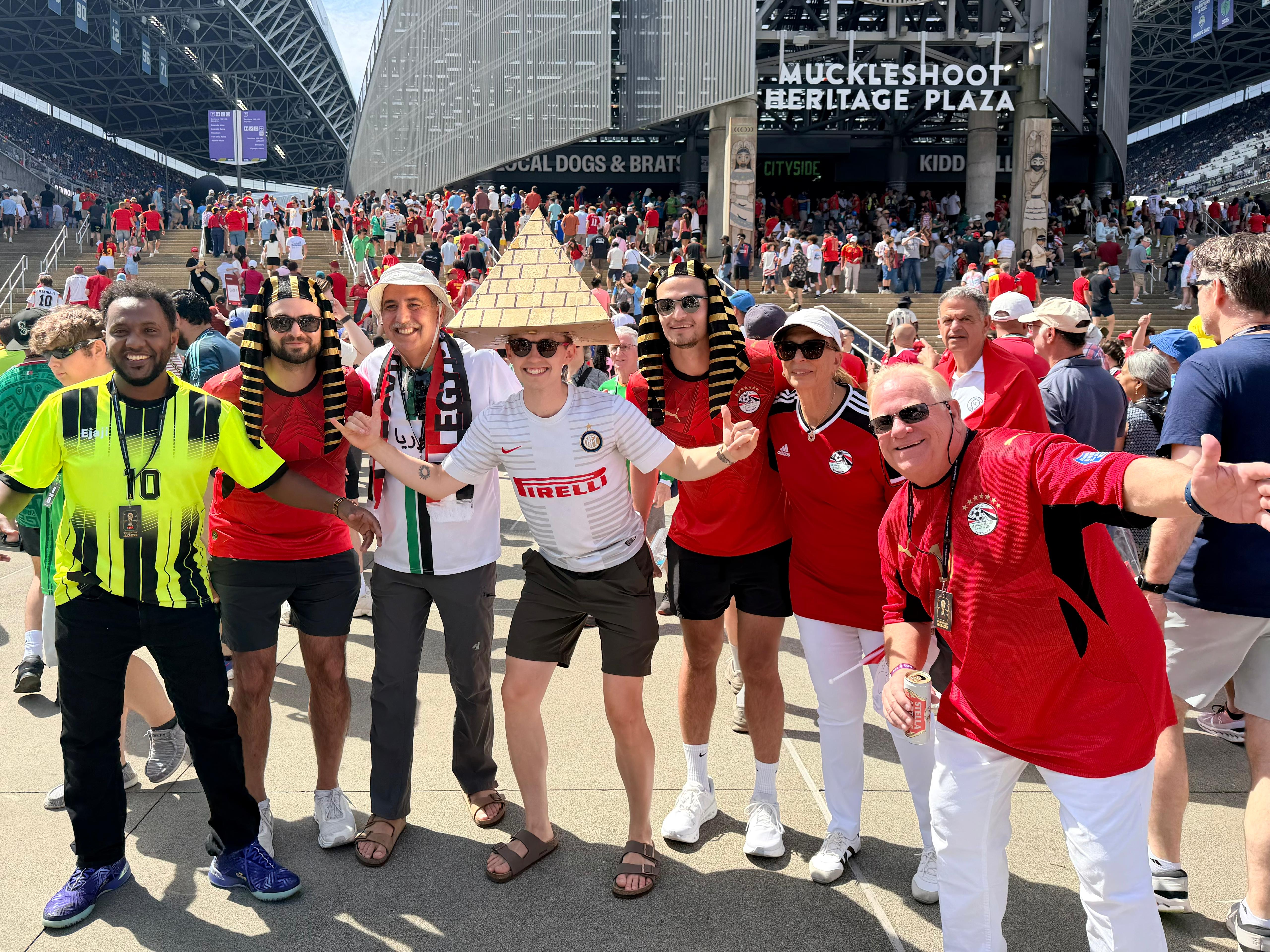 A group of World Cup fans celebrating outside the stadium
